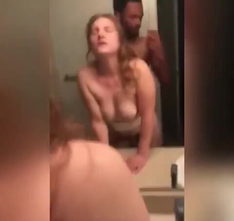 White girl with a black man behind her pounding her hard in restroom pic