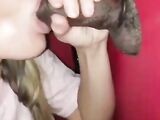 Blonde briefly licking and sucking black dick at gloryhole