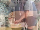 Surprise anal fuck in the kitchen with female partner